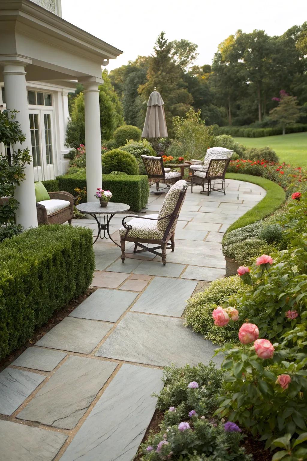 A slate path that effortlessly connects to a welcoming outdoor area.