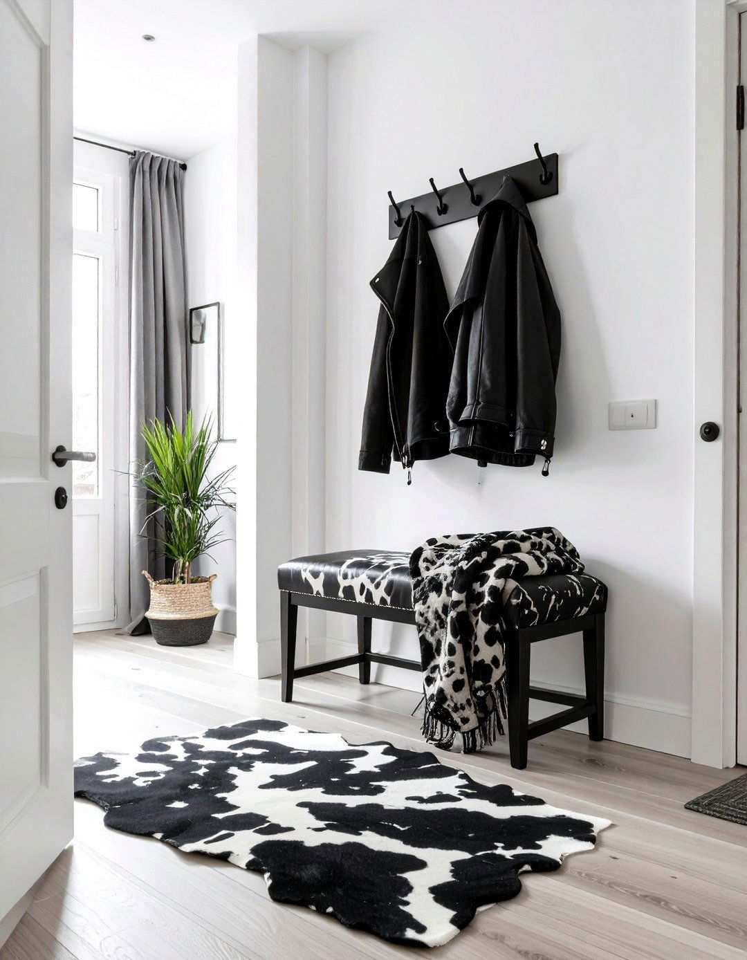 Storage Bench in a Striking Cow Hide Print - 20 Black and White Hallway Ideas
